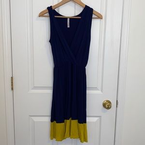 Navy v-neck dress with yellow stripe
